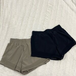 Black and tan shorts, pack size small to medium